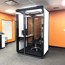 Load image into Gallery viewer, Soundproof phone booth 'delta M' by Getawayer Canada Inc. Now available in the USA. Portable office pod. Privacy booth. Individual workstation.