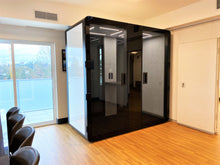 Load image into Gallery viewer, Soundproof office booth, meeting pod 'delta L' by Getawayer Canada Inc. Now available in the USA. Portable office pod. Privacy booth. Individual workstation.