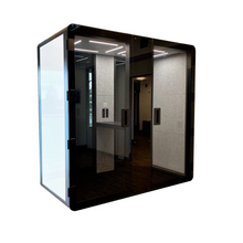 Load image into Gallery viewer, Soundproof office booth, meeting pod 'delta L' by Getawayer Canada Inc. Now available in the USA. Portable office pod. Privacy booth. Individual workstation.