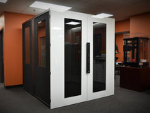 Load image into Gallery viewer, Meeting room 'Tilbury XL' installed in the show room. Large office pod suitable for malti-person meetings and interviews.. For Canada and USA.