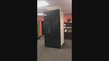 Load and play video in Gallery viewer, Video review Office Phone Booth &#39;delta S&#39;. Black and white soundproof office pod. Getawayer Canada Inc. No ROOM for distractions. Made in Canada.
