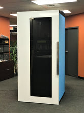 Load image into Gallery viewer, Office Phone Booth &#39;Tiblury S&#39; white door and sky blue  felt side walls. Privacy pod made in Canada, Vancouver BC. No ROOM for distraction.
